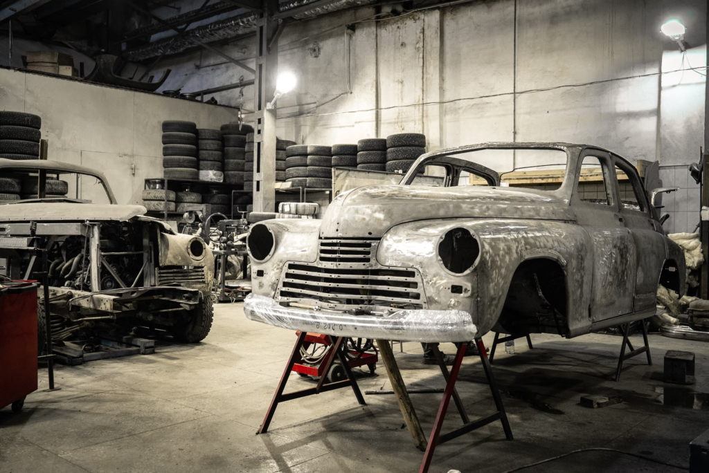 Old cars in auto repair shop