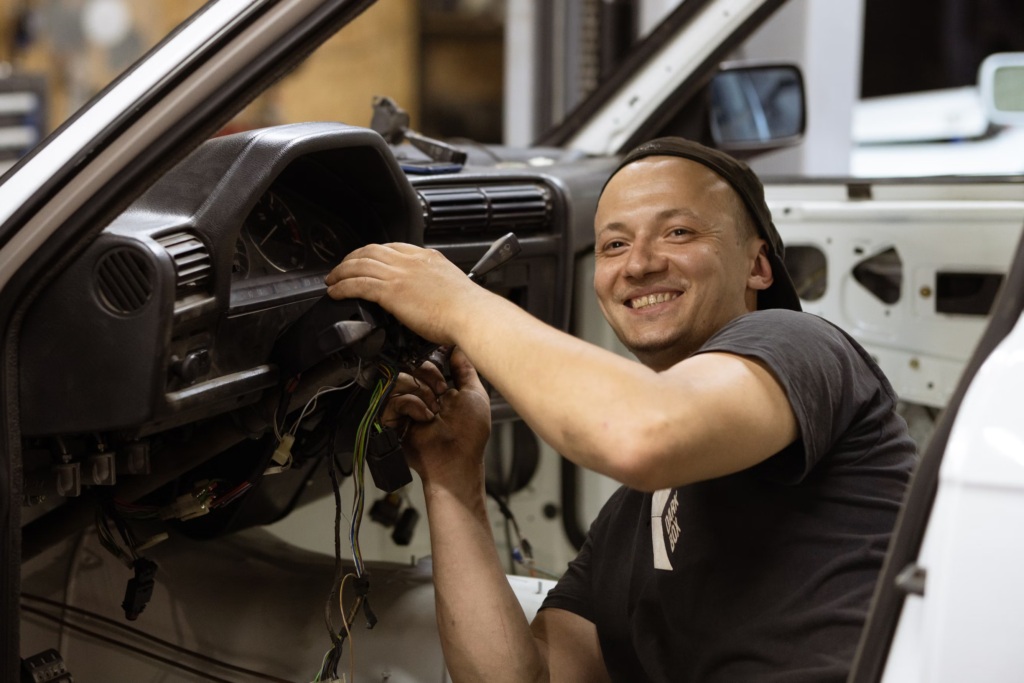 A man working at an auto repair shop